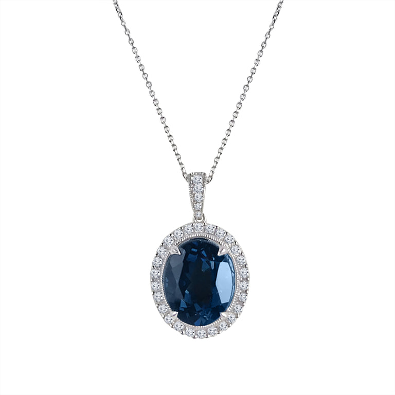 Oval Vivid Blue Topaz Pendant Necklace with Diamond Halo