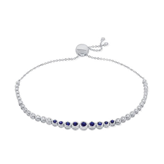 Graduated Blue Sapphire and Diamonds Bezel Set Bolo Bracelet in 14K White Gold