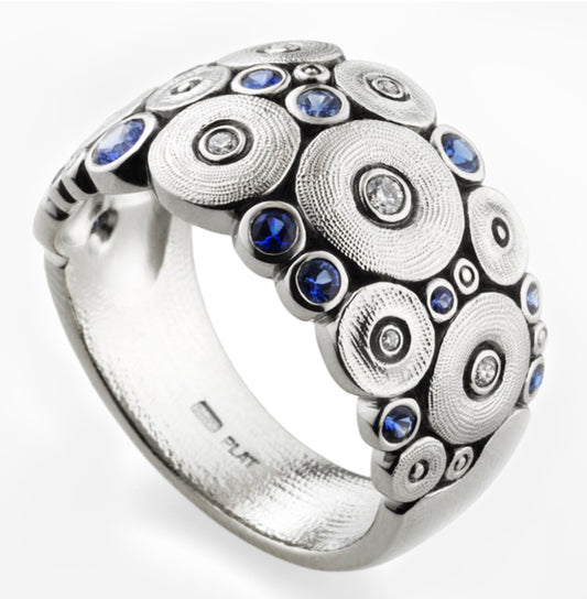 ALEX SEPKUS PLATINUM OCEAN RING WITH 13 MIXED BLUE SAPPHIRES...